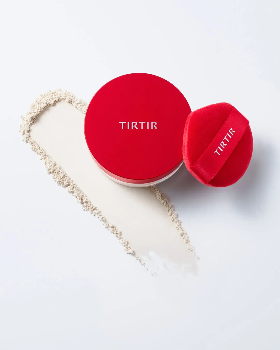 TIRTIRのパウダー容器と専用パフ、そしてパウダーのテクスチャー